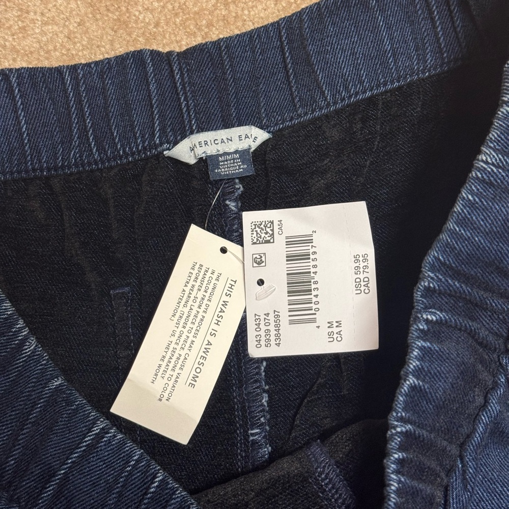 AMERICAN EAGLE COZY DREAMY DRAPE LOW-RISE ULTRA WIDE-LEG JEAN - Picture 4 of 5